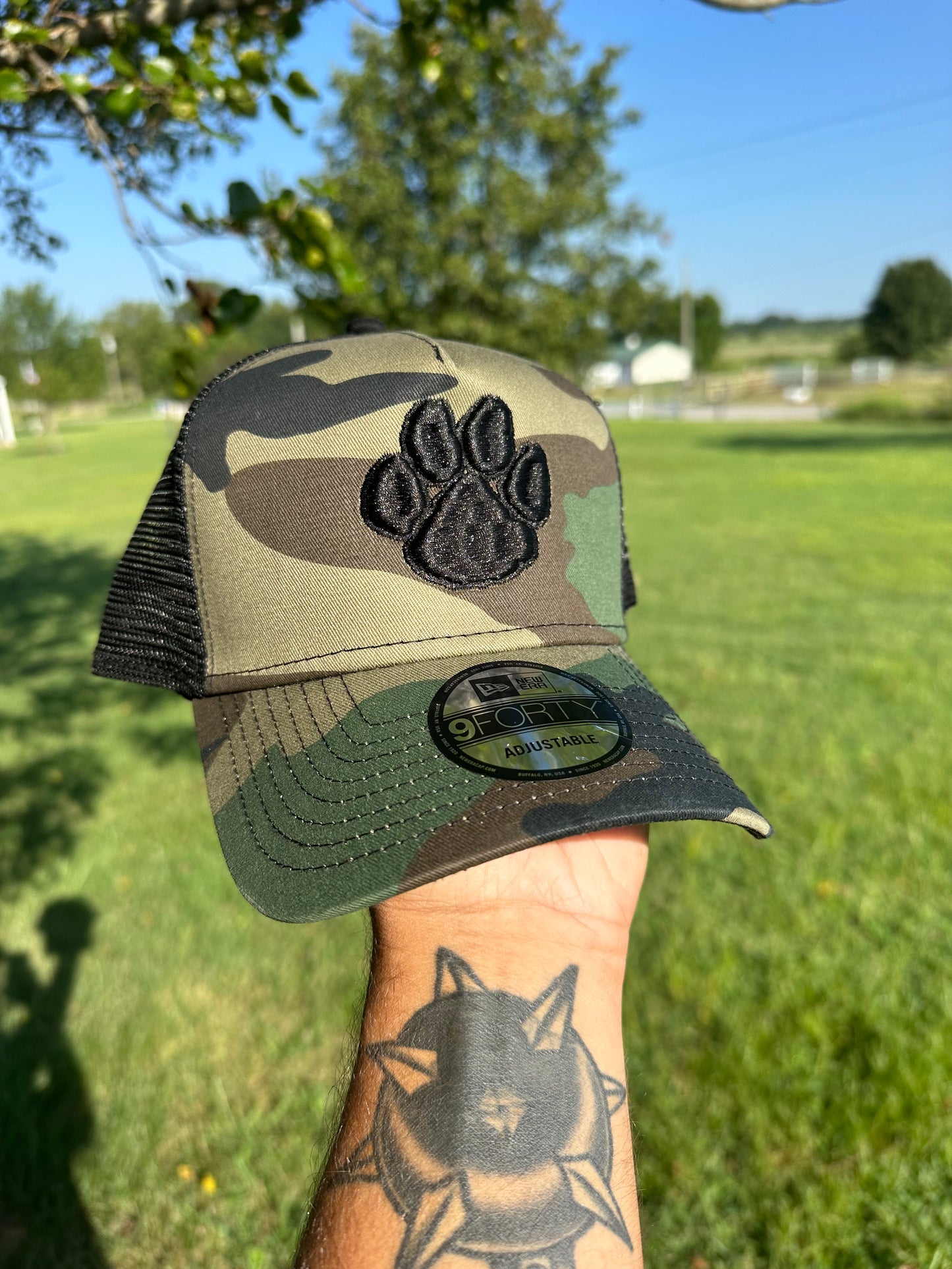 COWETA YOUTH FOOTBALL - BLACK OUT PAW - NEW ERA TRUCKER (PRE ORDER)